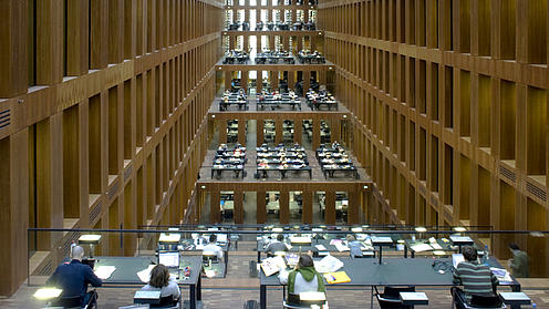 Students in a very big library.