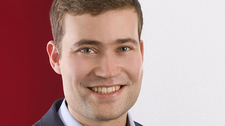 Ein Porträt-Foto von Marc Hüsch