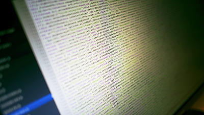 Programmcode an einem Bildschirm.