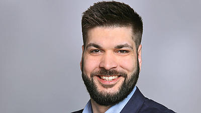 Ein Porträt-Foto von Ken Robin V.